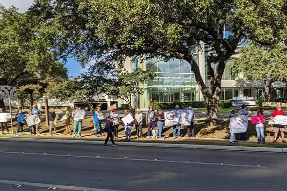 anti-voucher action in Oak Lawn, Dallas