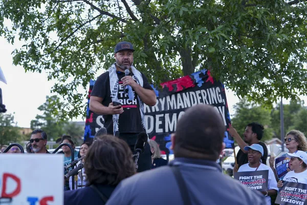Tevita 'Uhatafe speaks at the Arlington 'Fight the Trump Takeover' Rally