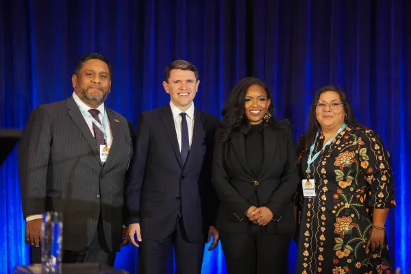 From left: Texas AFL-CIO President Leonard Aguilar, state Rep. James Talarico, and U.S. Rep. Jasmine Crockett, and Texas AFL-CIO Secretary-Treasurer Lorraine Montemayor pose for a photo following a debate at the Texas AFL-CIO COPE Convention in Georgetown, Texas on Saturday, Jan. 24, 2026. Bob Daemmrich for The Texas Tribune via POOL