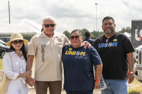Dean Corgey poses with his wife and Texas AFL-CIO leadership