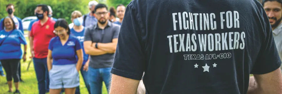 A picture of the back of a t-shirt reading "Fighting for Texas Workers."