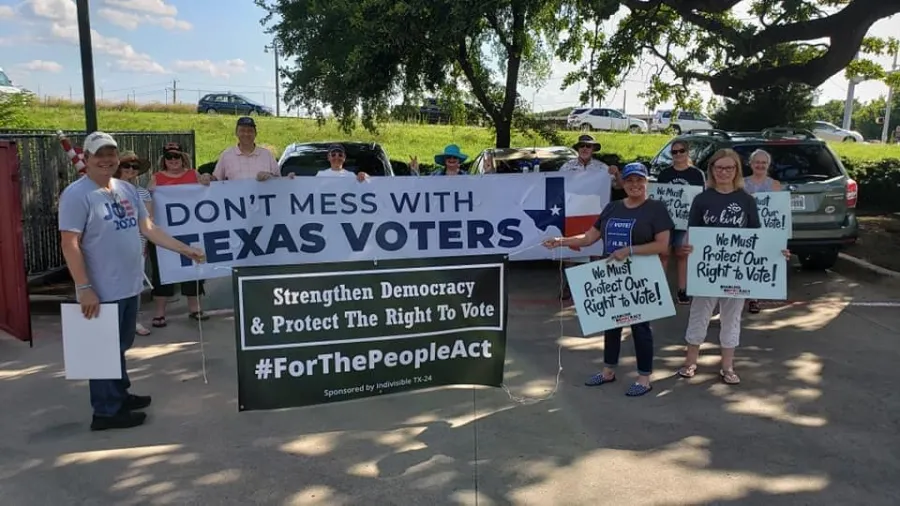 Jan McDowell (at right) stands up for voter rights in Texas