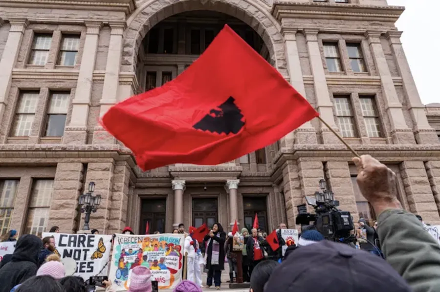 Cesar Chavez flag waving in front of the Capitol