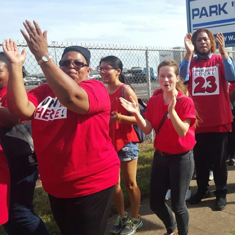 UNITE HERE! Local 23 workers march on a picket line