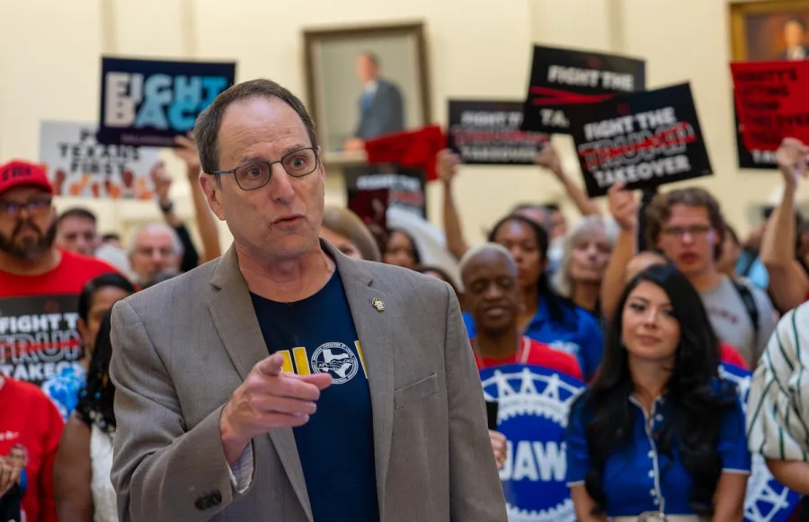 Rick Levy speaks at a Fight the Trump Takeover rally at the Texas Capitol