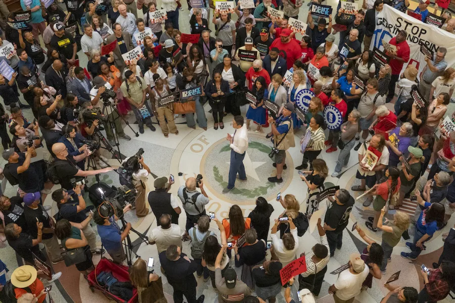 Texas House Democratic Caucus Chair Gene Wu (HD-137) speaks to the crowd at the Texas Capitol on Friday morning. Photo courtesy Texas AFL-CIO.
