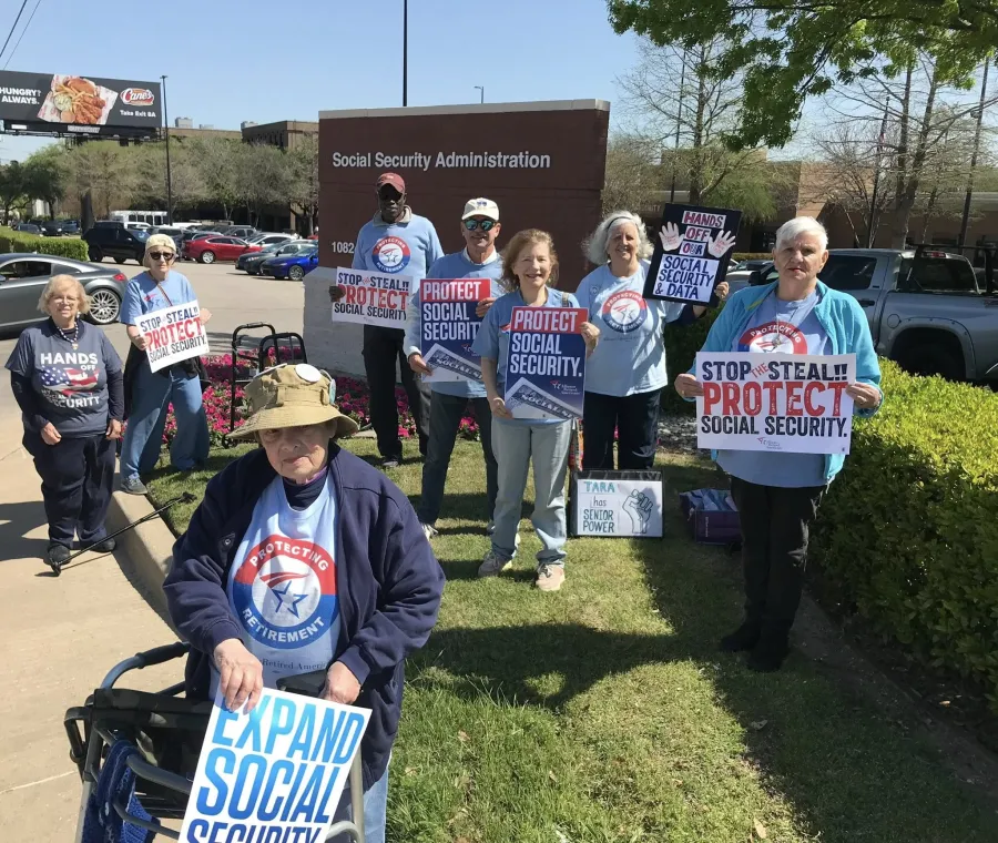 TARA members hold signs at a Protect Social Security rally