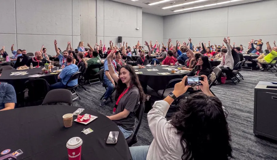 Each person with a raised hand was a first-time Texas YALL Summit attendee!