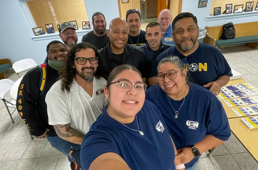 Port Arthur volunteers pose for a group photo before heading out for a block walk