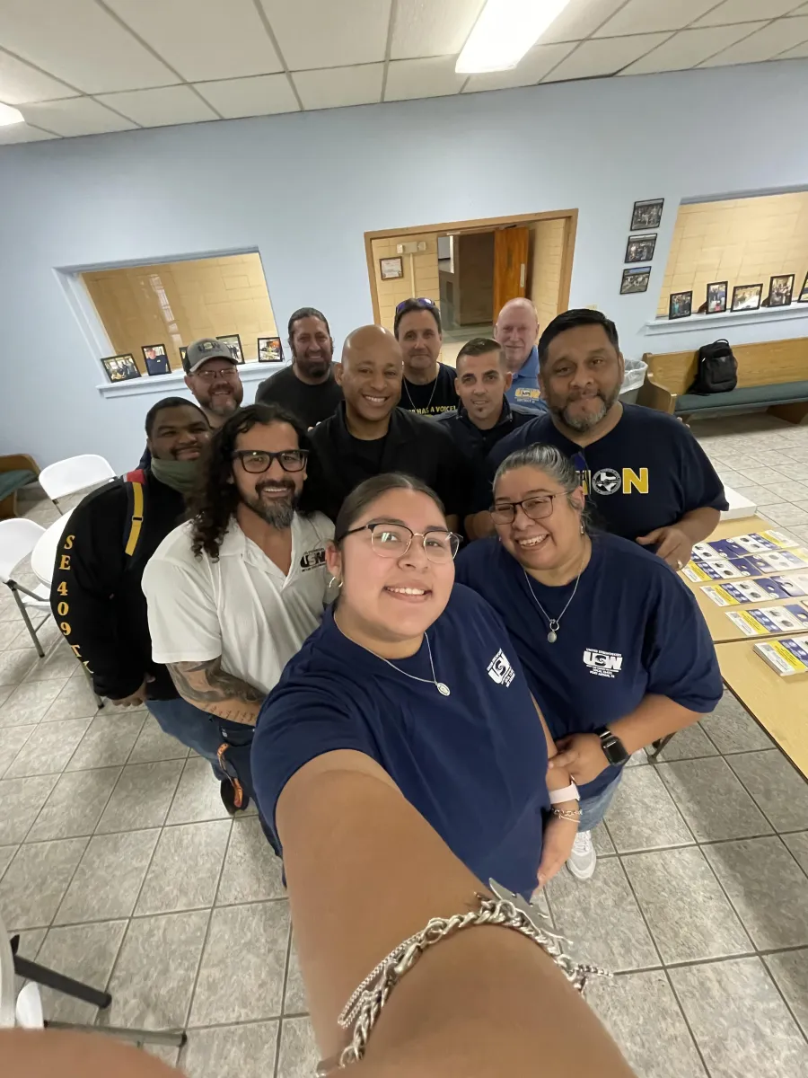 Volunteers pose for a photo before a block walk