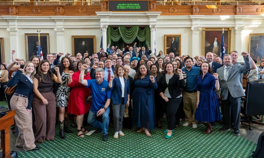 Union members at the swearing in of Senator Taylor Rehmet in Feb. 2026