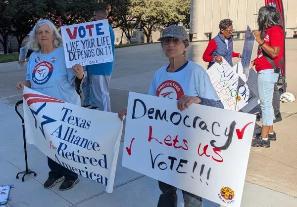 Patricia and Charlotte, top activists, attended labor's rally