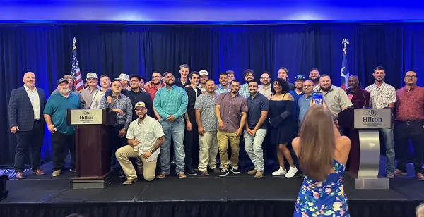 A group photo of UA Local 100’s 2025 graduating apprentice class