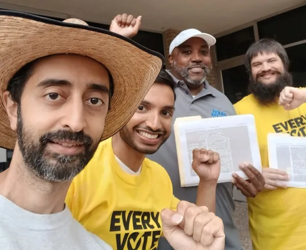 Political Director Earnest Tilley (white cap) with youth actists