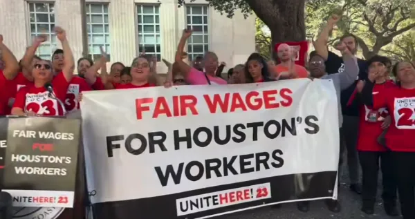 UNITEHERE Local 23 members pictured picketing outside of Houston City Hall as a warning that the Hildon Americas is at risk other worker actions if a new contract is not reached.