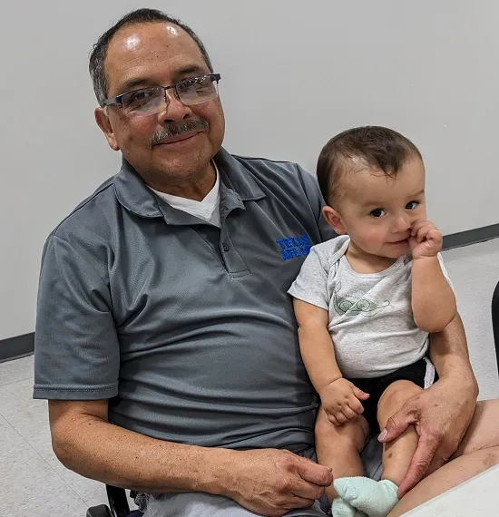 Alliance/AFT retired leader George Rangel and friend