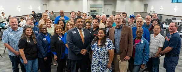 Leonard, Lorraine, and Rick stand with the Texas AFL-CIO Executive Board