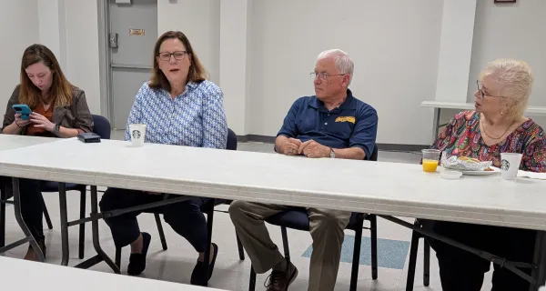 Julie Johnson talks with labor