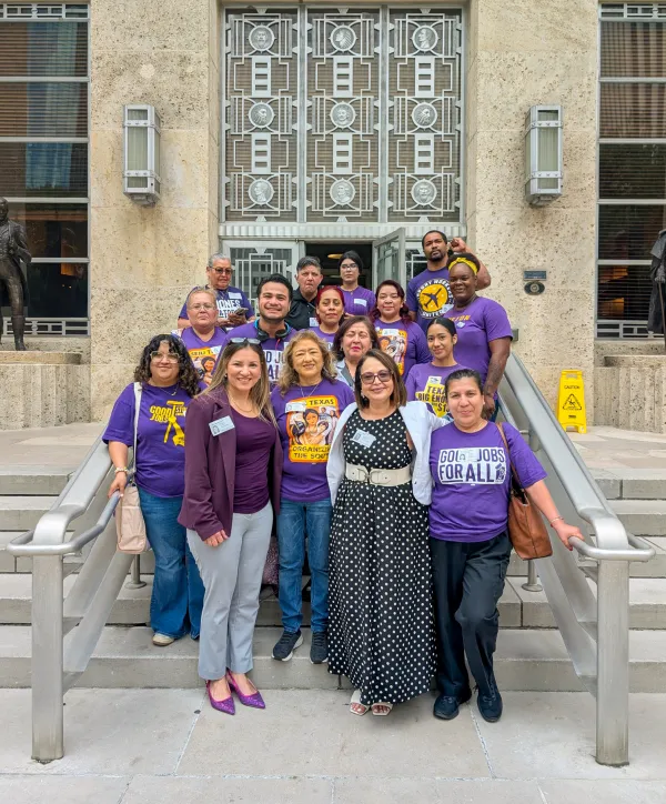 SEIU Texas members stand in front of Houston City Hall